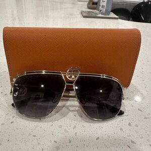 Michael Kors sunglasses.